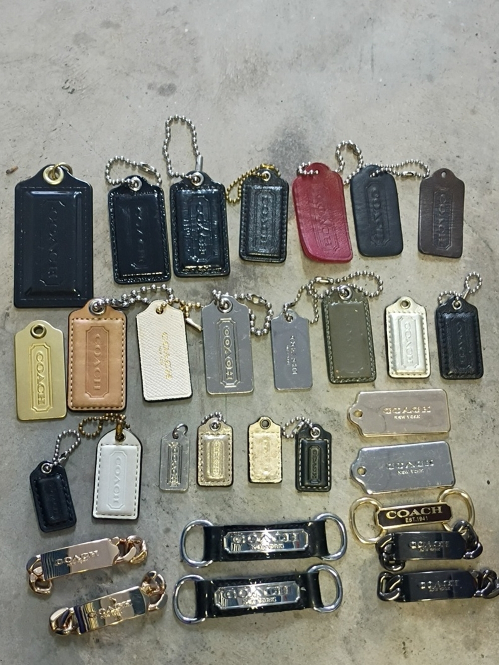 COACH Leather and Metal Bag Tags